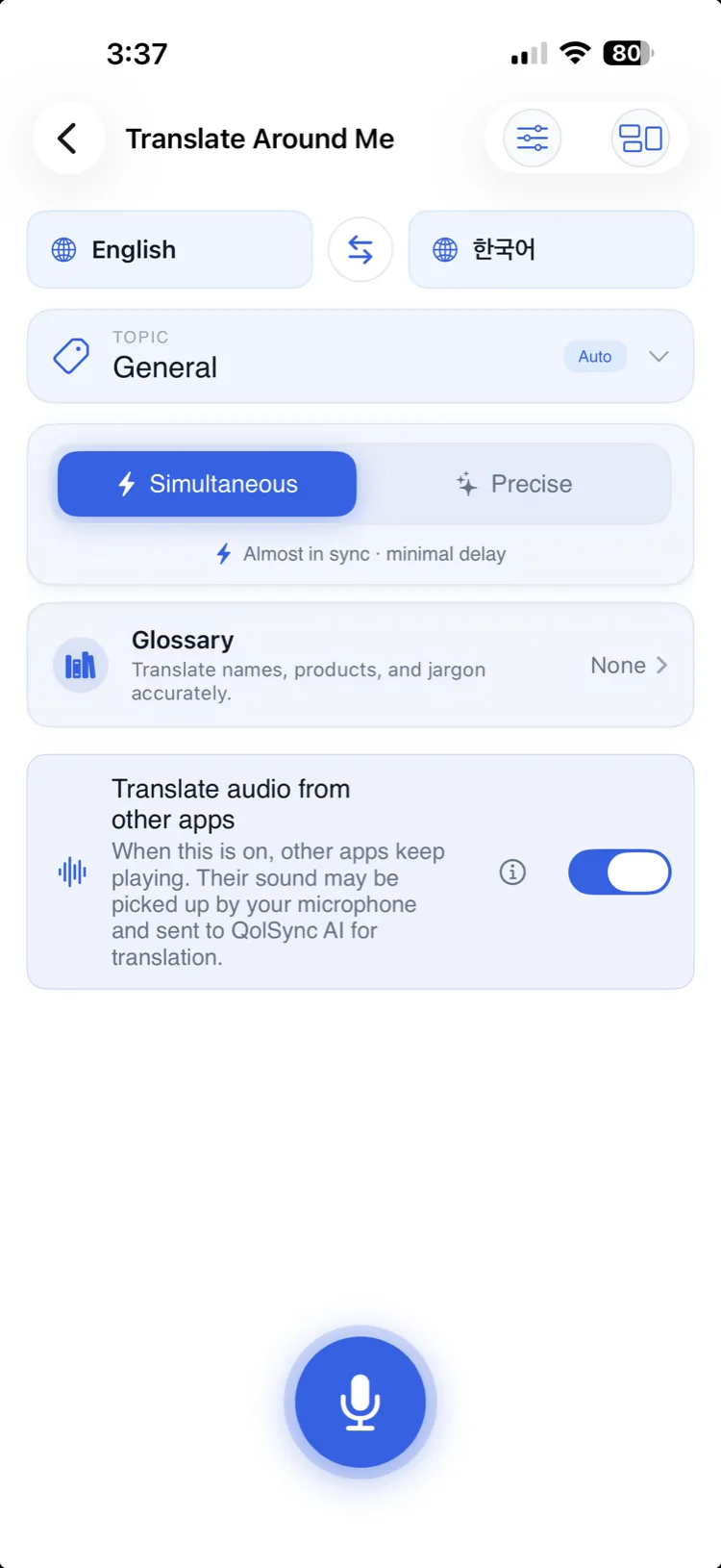 iPhone showing the "Translate Around Me" setup: a language pair, "Simultaneous" timing, and a glossary option